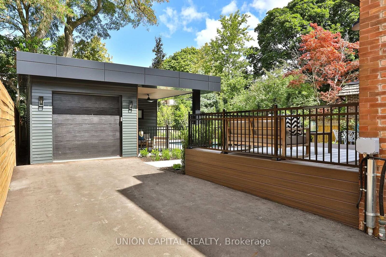 Private drive with built-in garage and entertaining deck