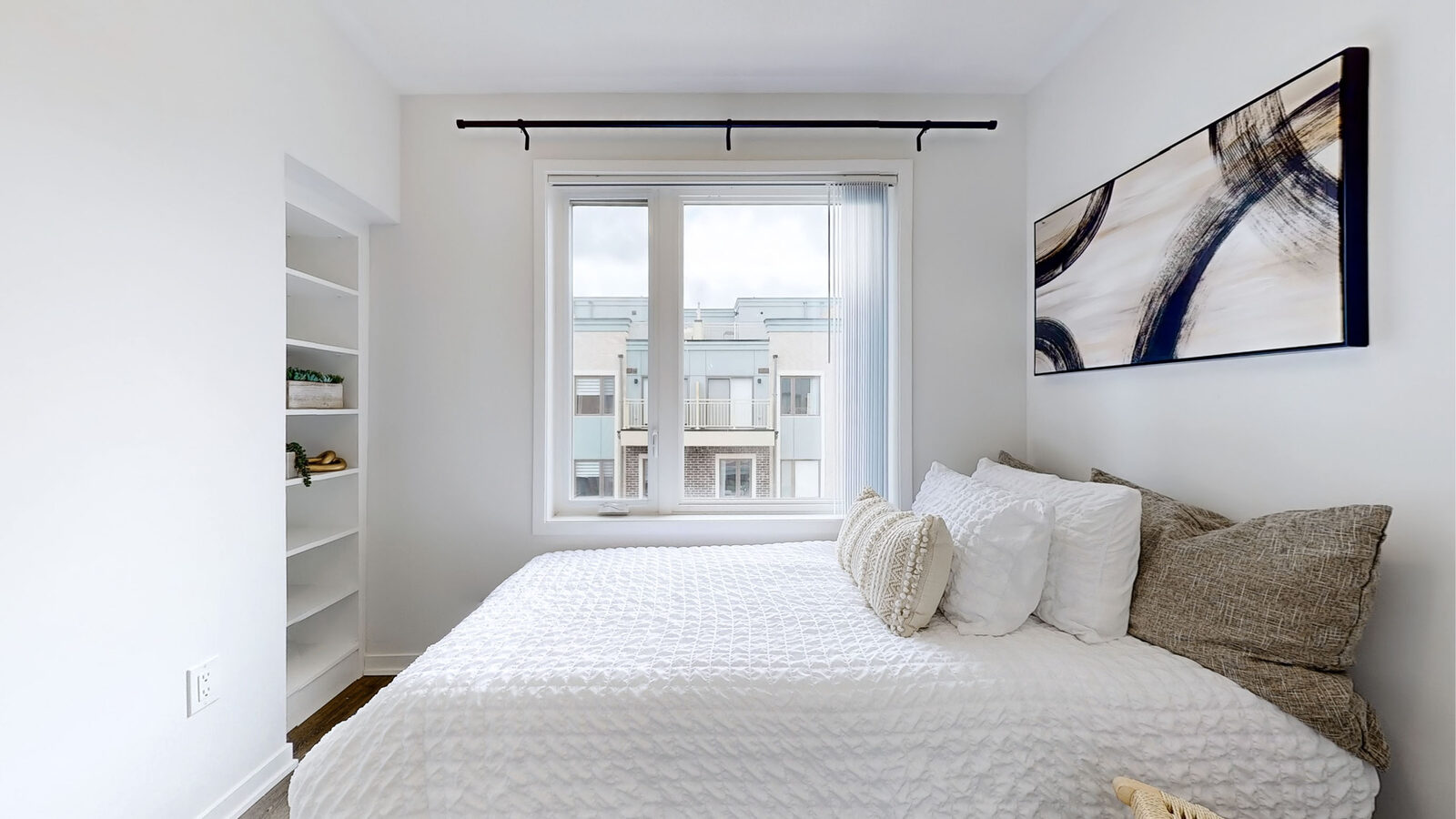 Bedroom with built-in shelving